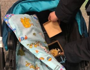 A passenger who tried to carry jewelry hidden in a baby stroller has been stopped