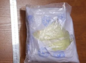 A passenger in a Cobalt was found to be carrying more than 1 kg of heroin